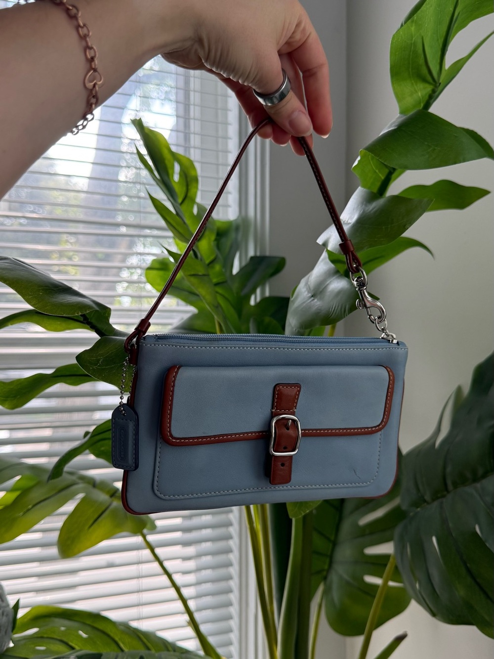 Coach Soho Light Blue Leather Wristlet With Brown Accent And Small Buckle